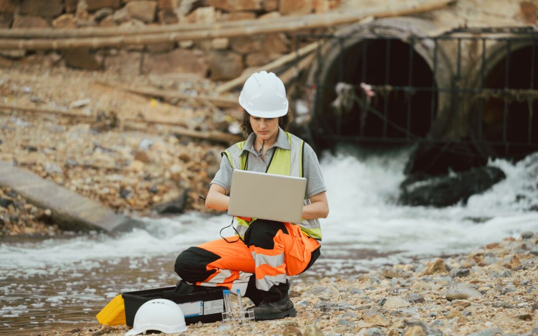 an image of a woman conducting a stormwater inspection